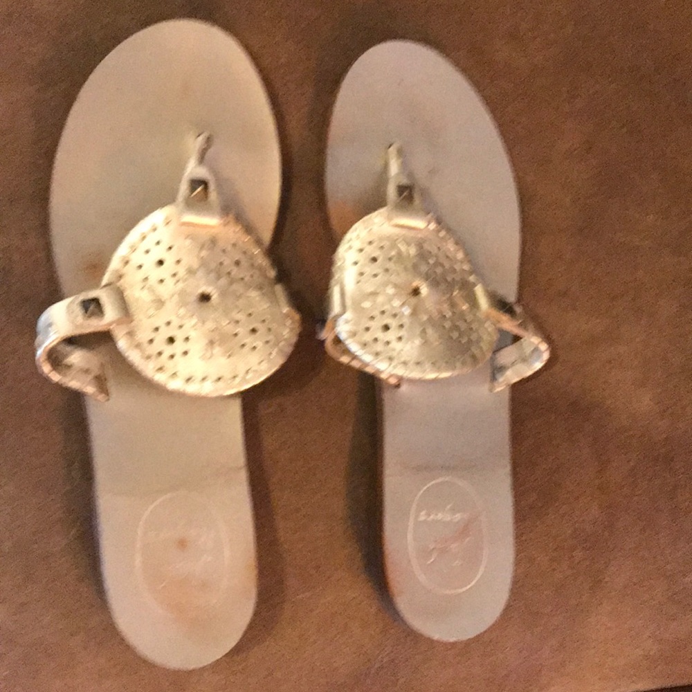 Jack Rogers gold medallion sandals.
